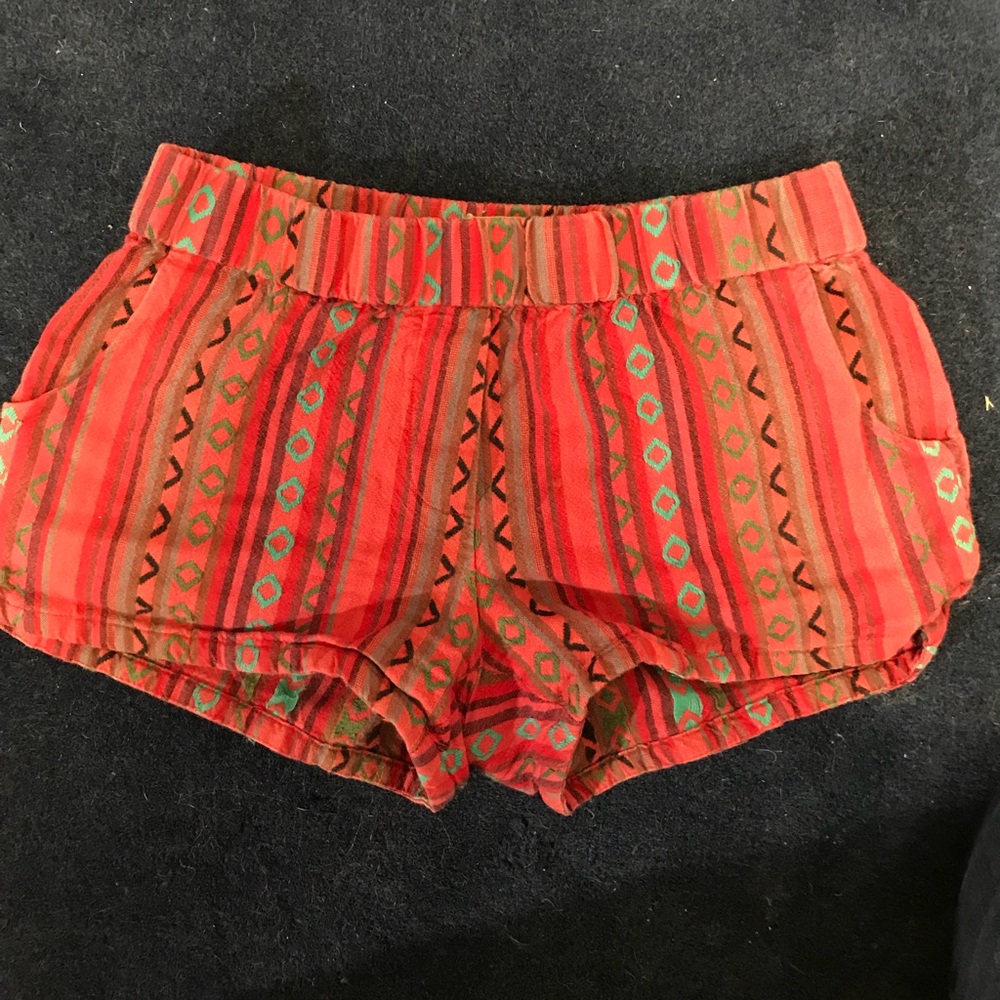 UO red tribal shorts